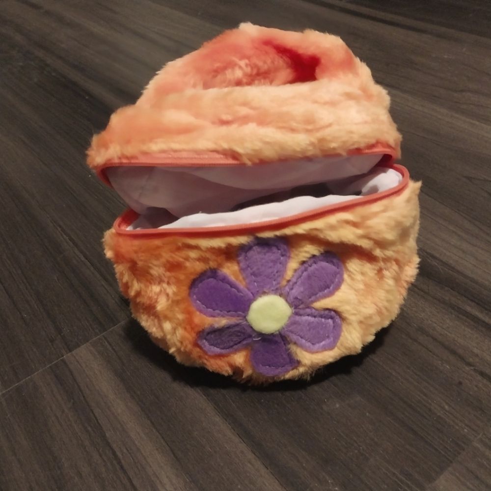 Adorable little girls purse or a awesome makeup bag